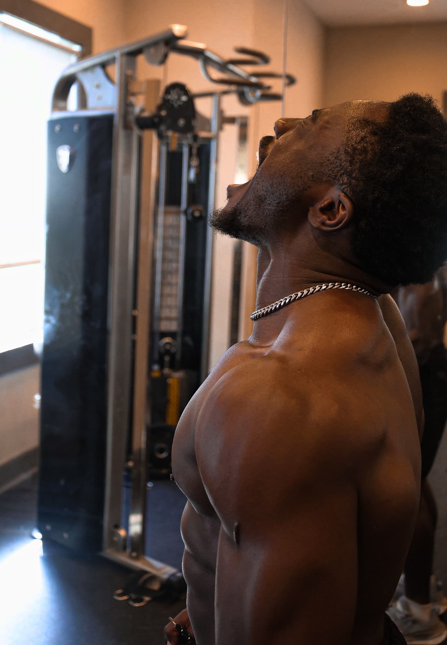 Adam Kia at cable machine